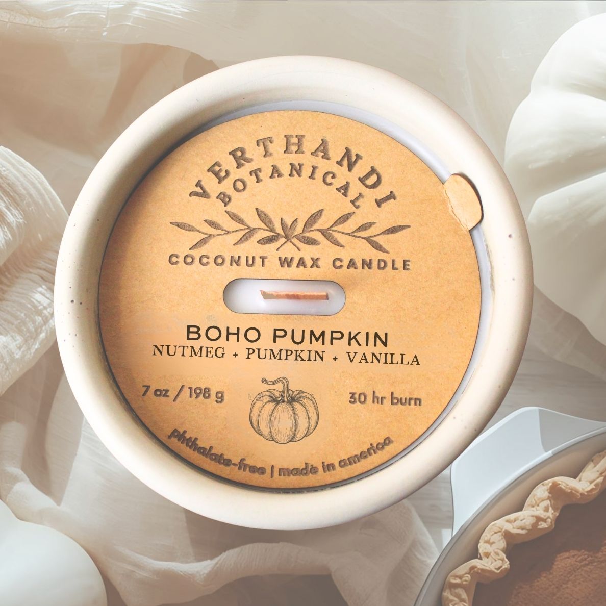 boho pumpkin coconut soy wax scented candle with crackling wood wick in concrete jar, top view of dust cover