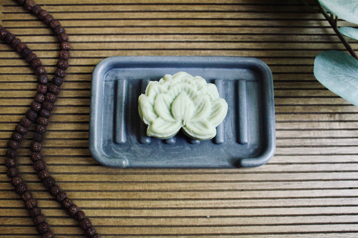 Rosemary + Mint Shampoo Bar with rosemary sprigs