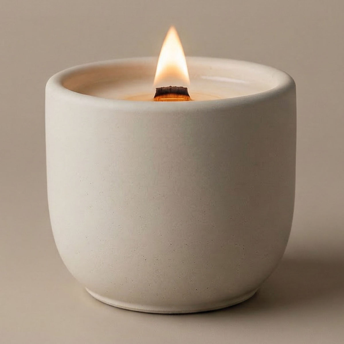 coconut wax scented candle with crackling wood wick in refillable concrete jar