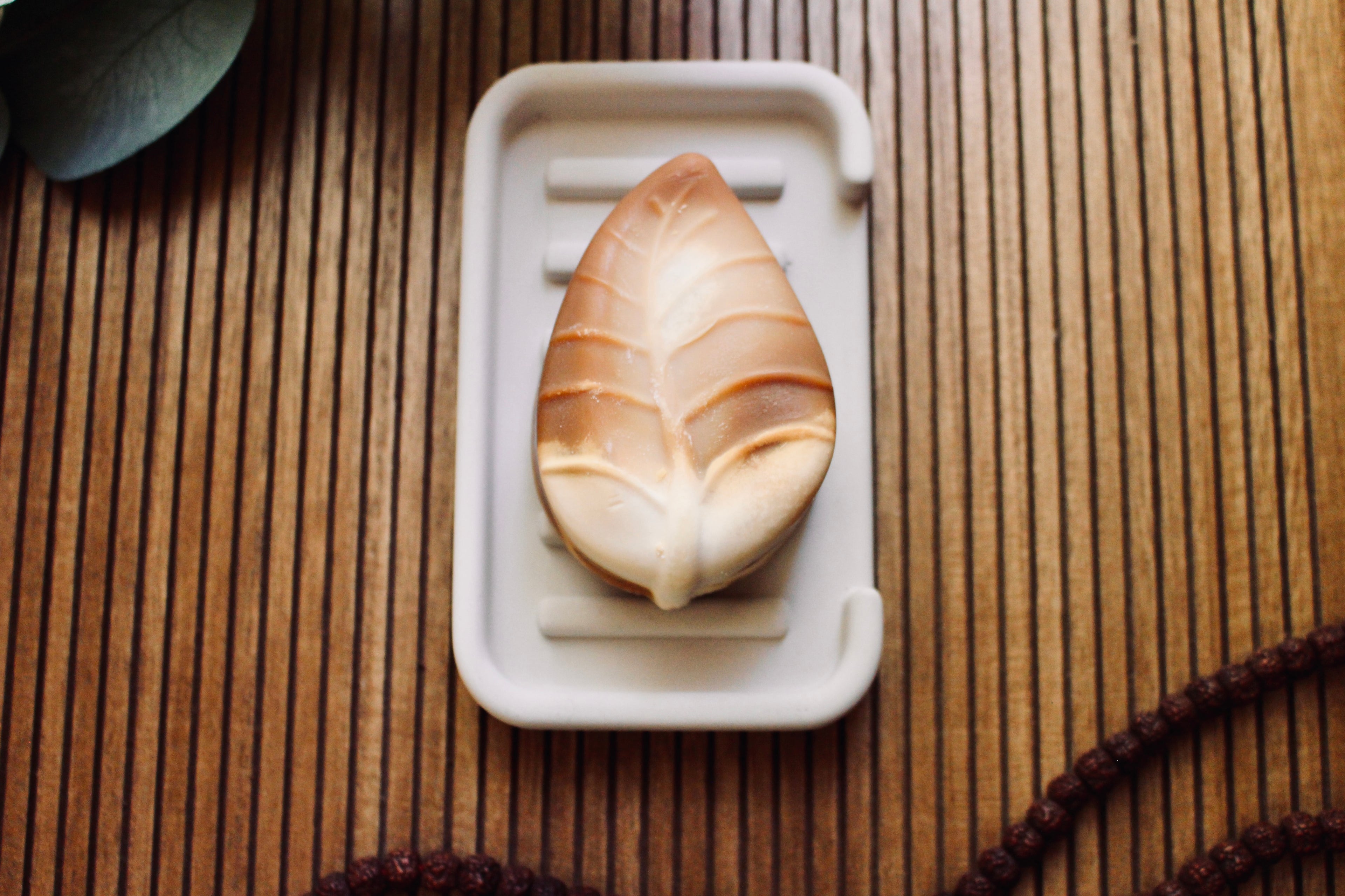 cardamom latte natural soap bar, top view of natural soap on hygge soap tray
