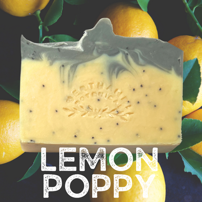 Lemon Poppy Natural Soap, Front view with lemons background.
