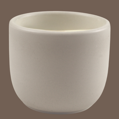 Empty cement jar for candle refills.