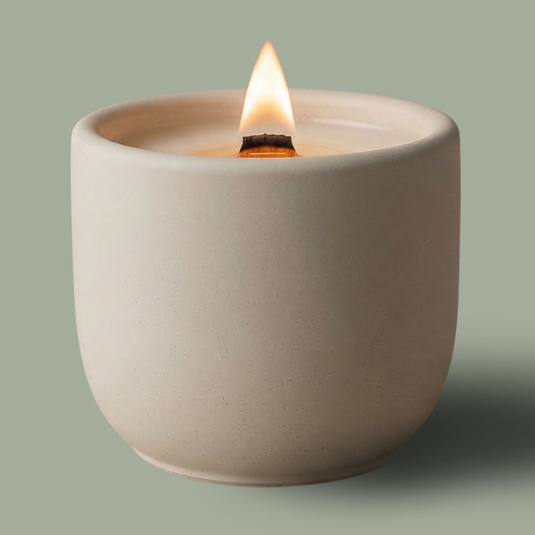 beach wood scented candle in concrete jar, with a crackling wood wick and coconut wax
