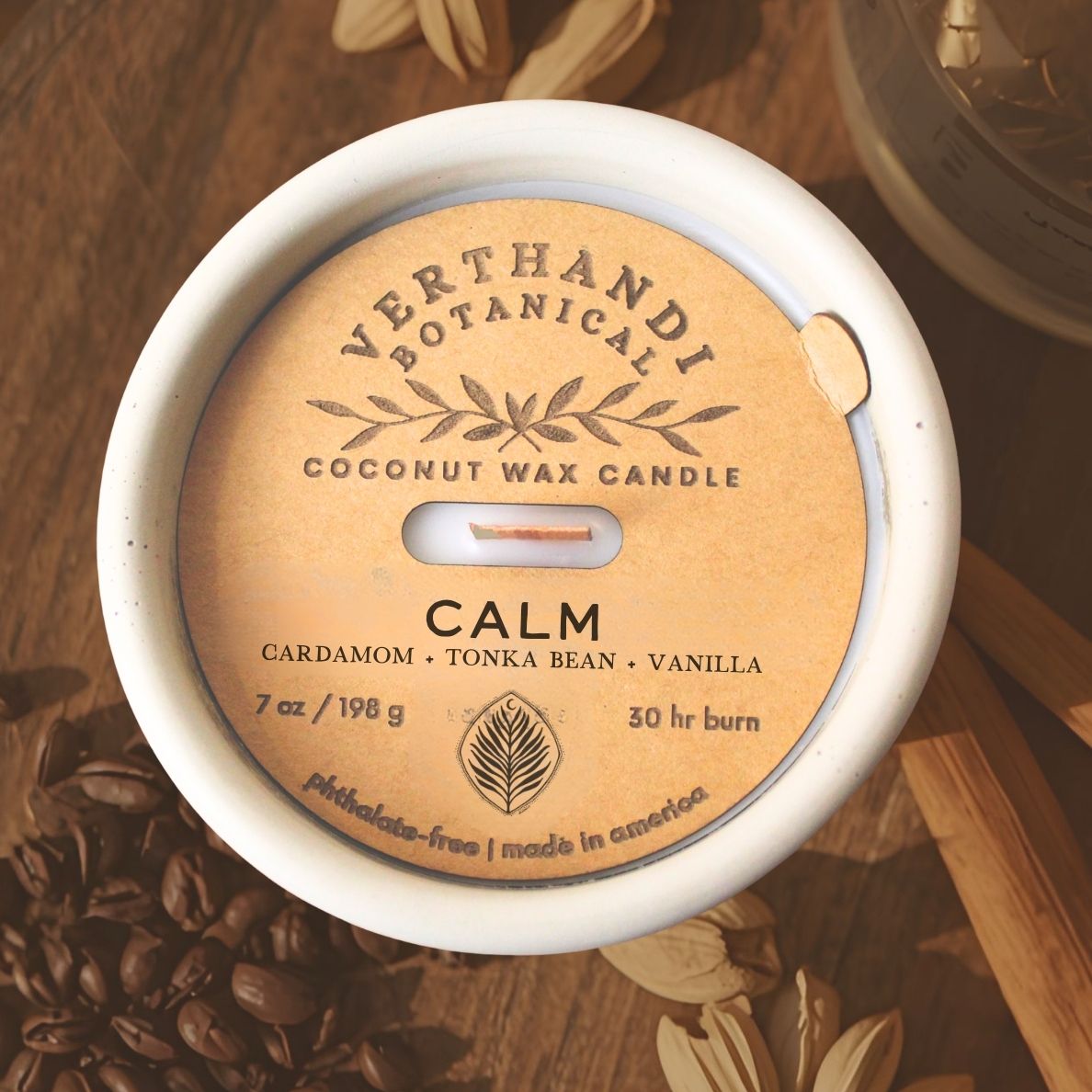 calm coconut soy scented candle with crackling wood wick in concrete jar, top view