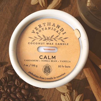 calm coconut soy scented candle with crackling wood wick in concrete jar, top view