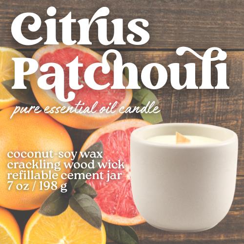 citrus patchouli essential oil candle with coconut soy wax, a crackling wood wick in a concrete jar with a crystal embed