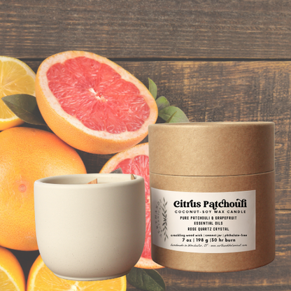 citrus patchouli essential oil candle with coconut soy wax, a crackling wood wick in a concrete jar with a crystal embed, side view of packaging