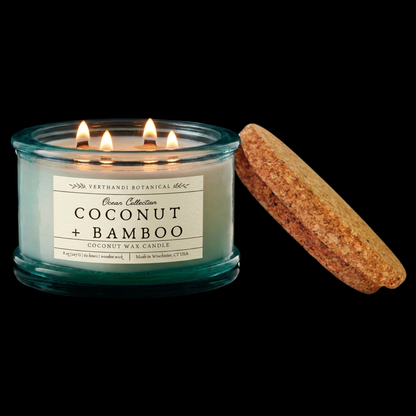 Coconut and bamboo scented candle in a recycled glass jar with cork lid. coconut wax and a crackling wood wicks. part of Verthandi Botanical&