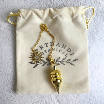 Copper pendulum with cream velvet pouch