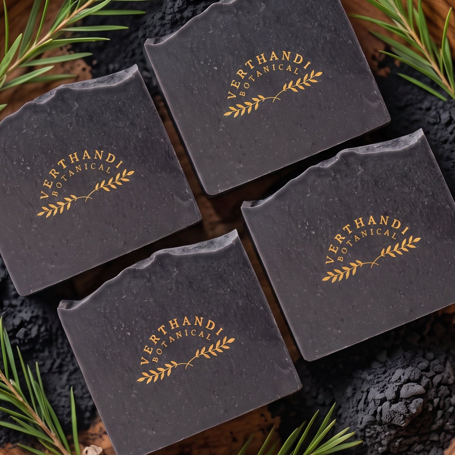Detox Charcoal Natural Soap made with activated charcoal and scented with pure essential oils of tea tree and eucalyptus surrounded by activated bamboo charcoal