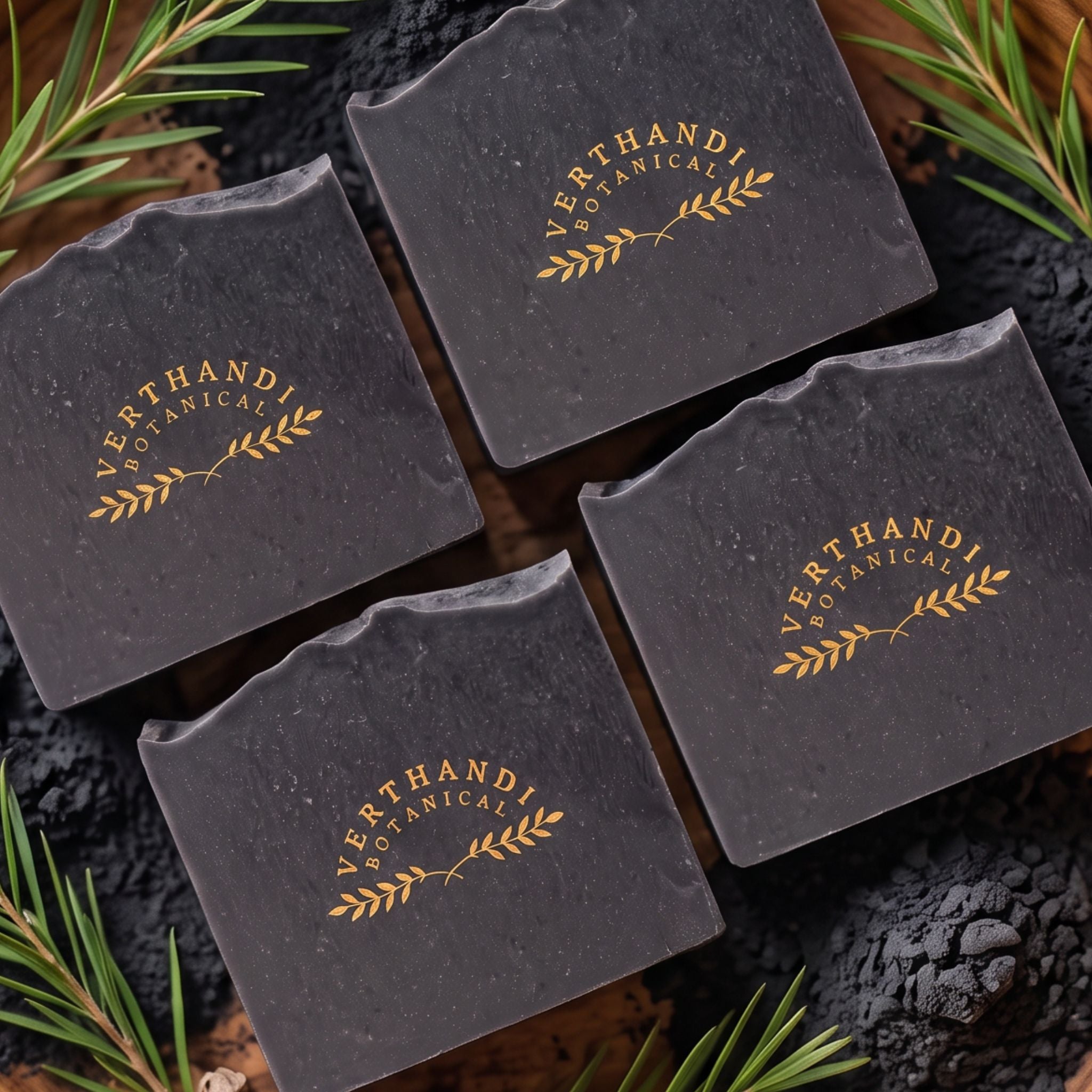 Detox Charcoal Natural Soap made with activated charcoal and scented with pure essential oils of tea tree and eucalyptus surrounded by activated bamboo charcoal