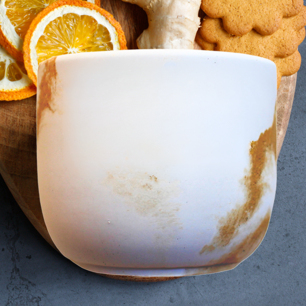 ginger snap coconut soy wax scented candle with a crackling wood wick in concrete jar, tinted jar