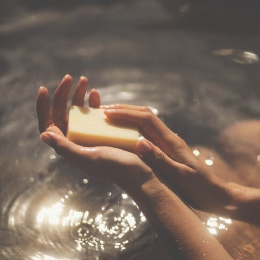 natural soap, washing hands in water