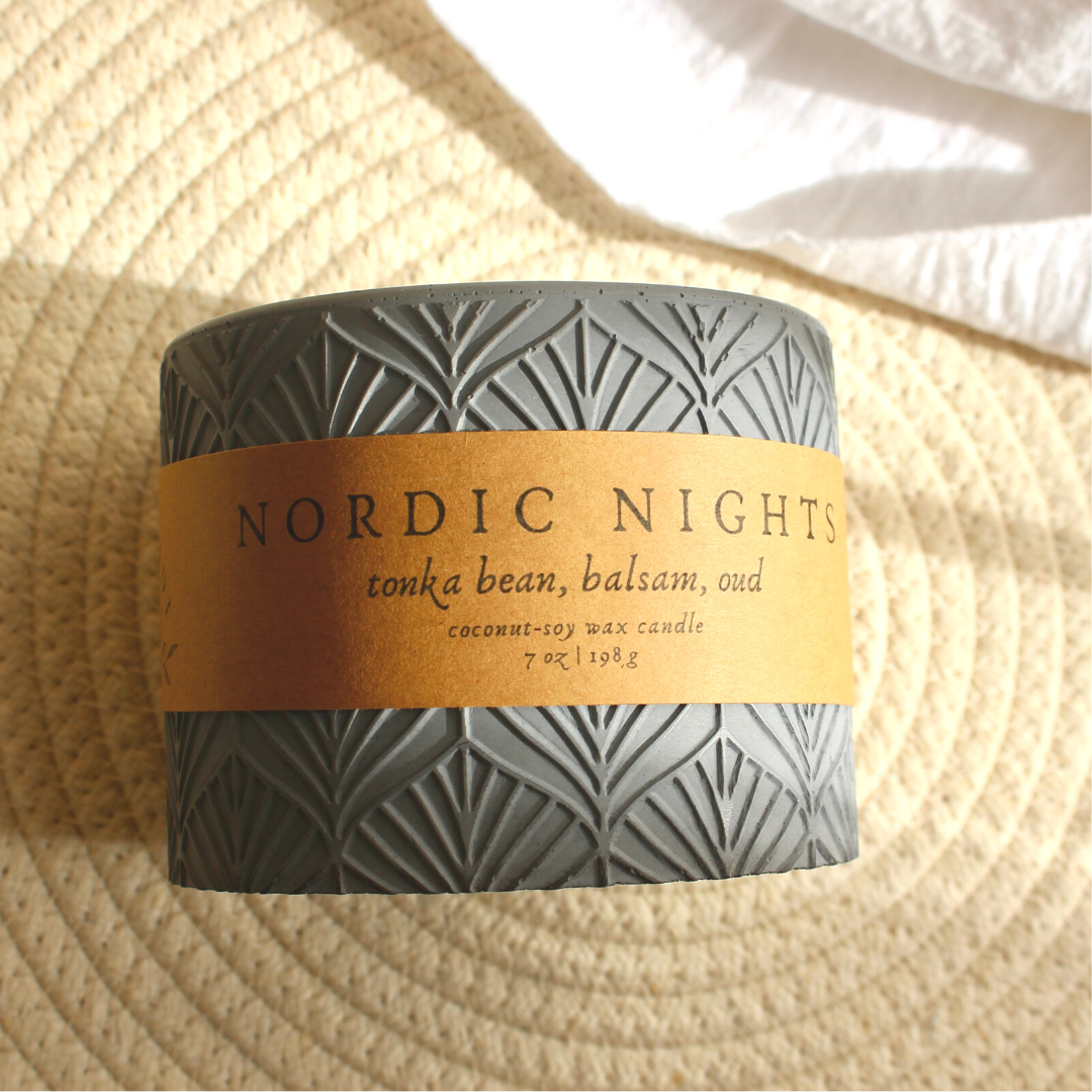 nordic nights coconut soy scented candle with crackling wood wick in gray concrete jar