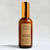 orange blossom room and linen spray made from clean phthalate-free fragrance in an amber glass bottle