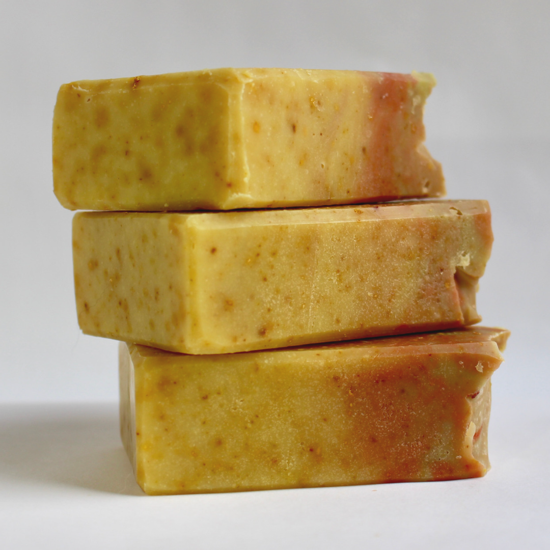 orange patchouli natural soap, side view of 3 stacked natural soaps